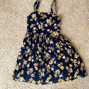 From Macy’s Backstage, Size Small, and Color dark blue with flowers